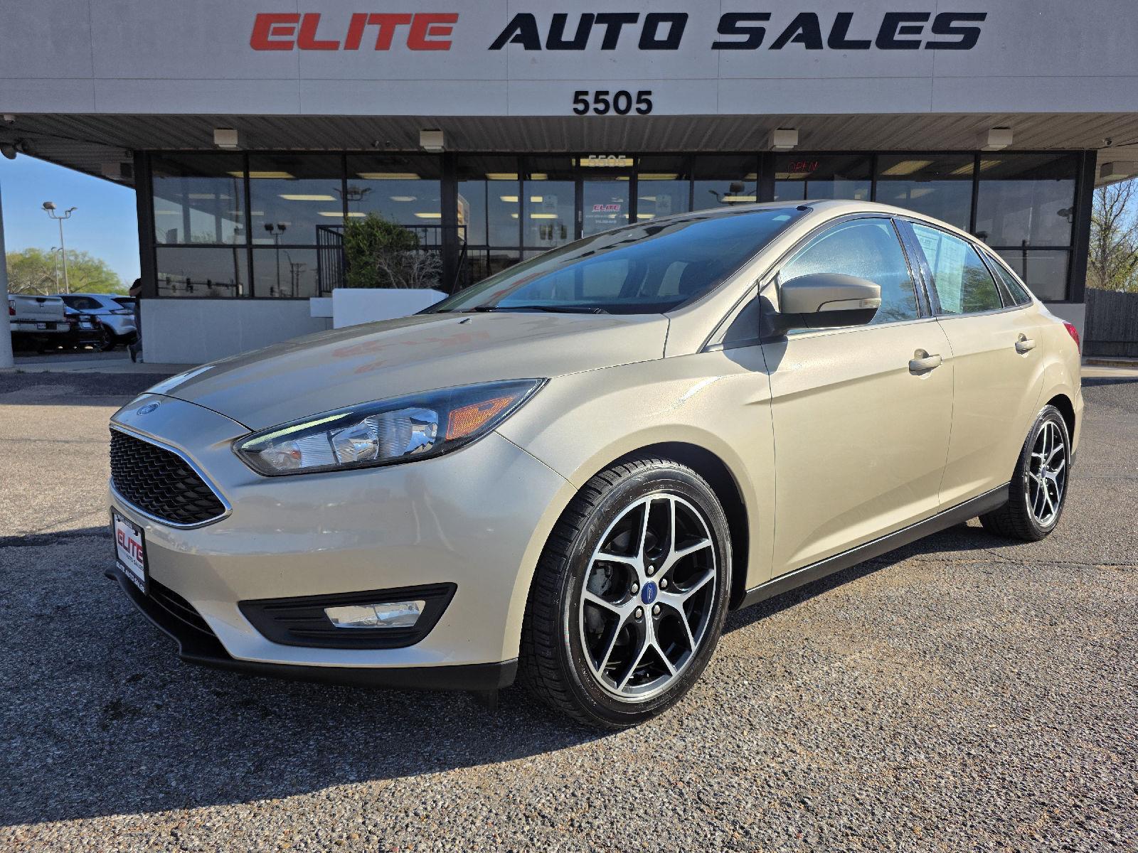White Gold Metallic 2018 Ford Focus SEL Sedan Front-Wheel Drive 6-Speed Automatic