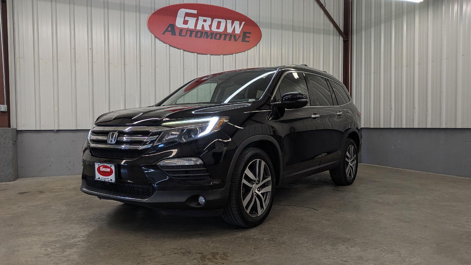 View vehicle photo 7