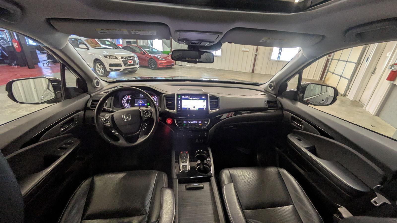 View vehicle photo 4