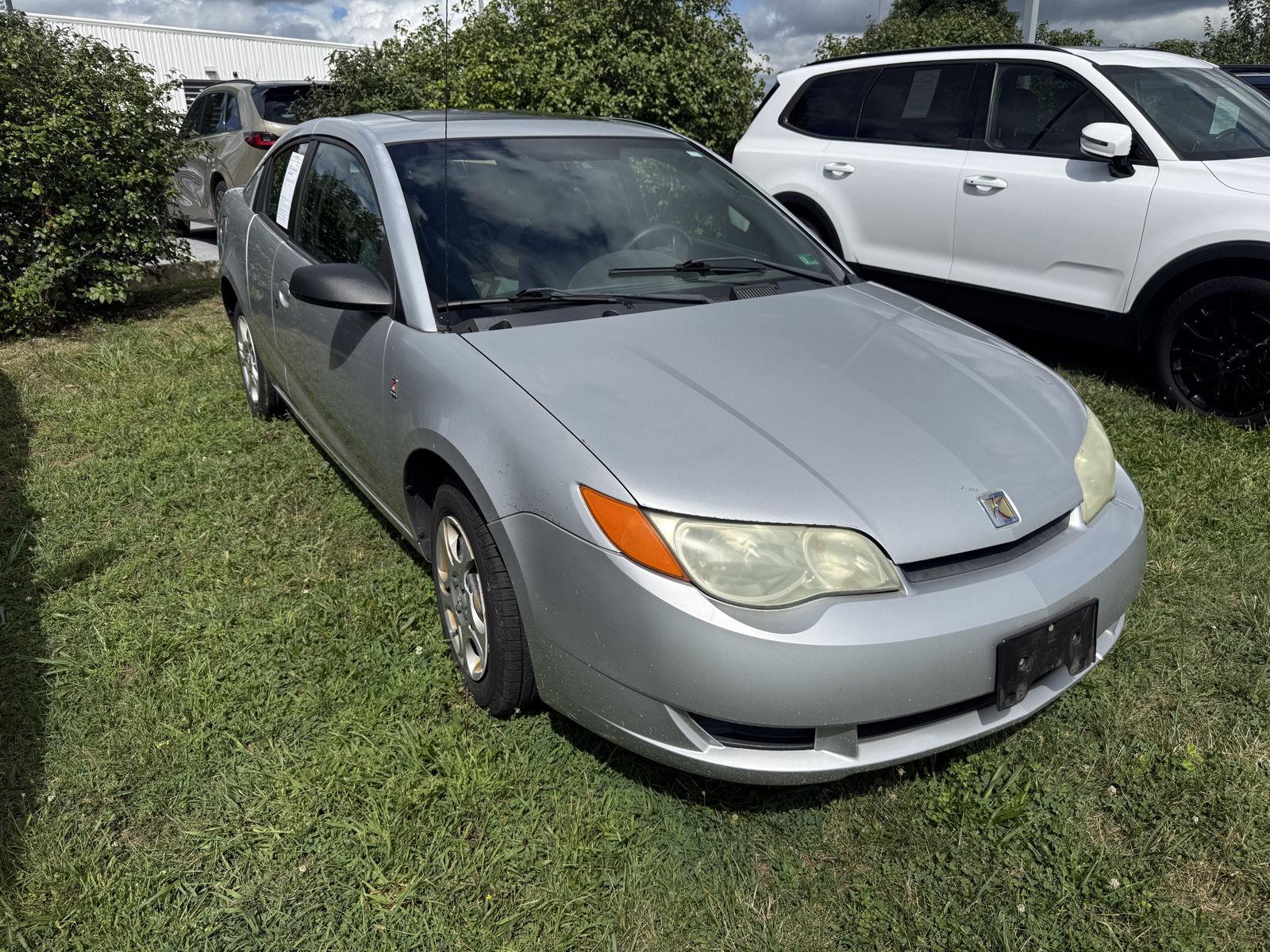 Silver Nickel 2004 Saturn ION Coupe Front-Wheel Drive 5-Speed Manual Overdrive
