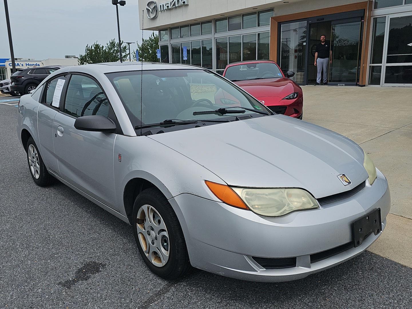 Silver Nickel 2004 Saturn ION Coupe Front-Wheel Drive 5-Speed Manual Overdrive