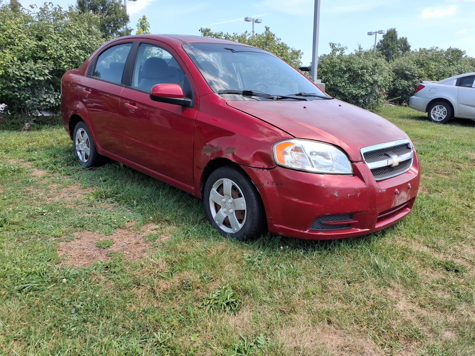 Sport Red 2011 Chevrolet Aveo Sedan Front-Wheel Drive 4-Speed Automatic