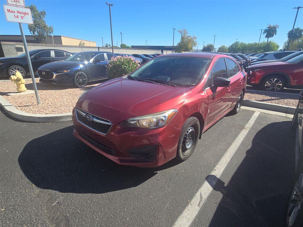 Crimson Red Pearl 2018 Subaru Impreza Sedan All-Wheel Drive Manual