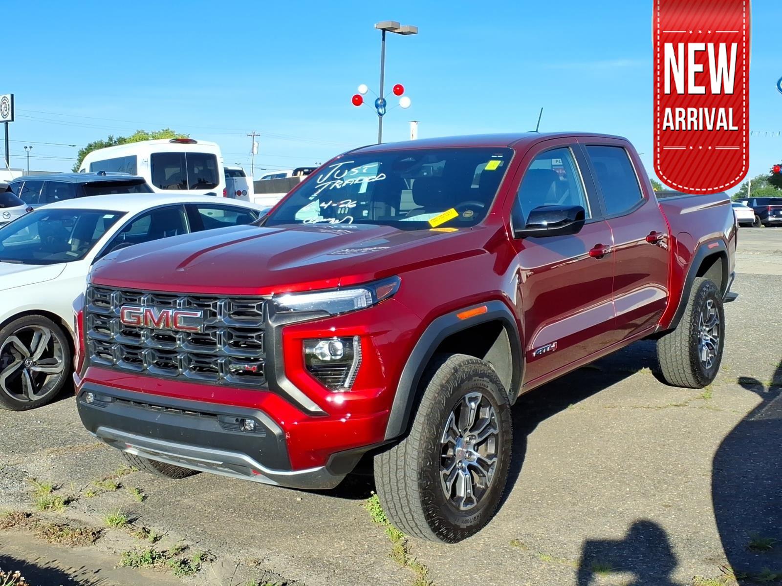 Volcanic Red Tintcoat 2025 GMC Canyon AT4 Crew Cab 4WD Pickup Truck Four-Wheel Drive 8-Speed Automatic