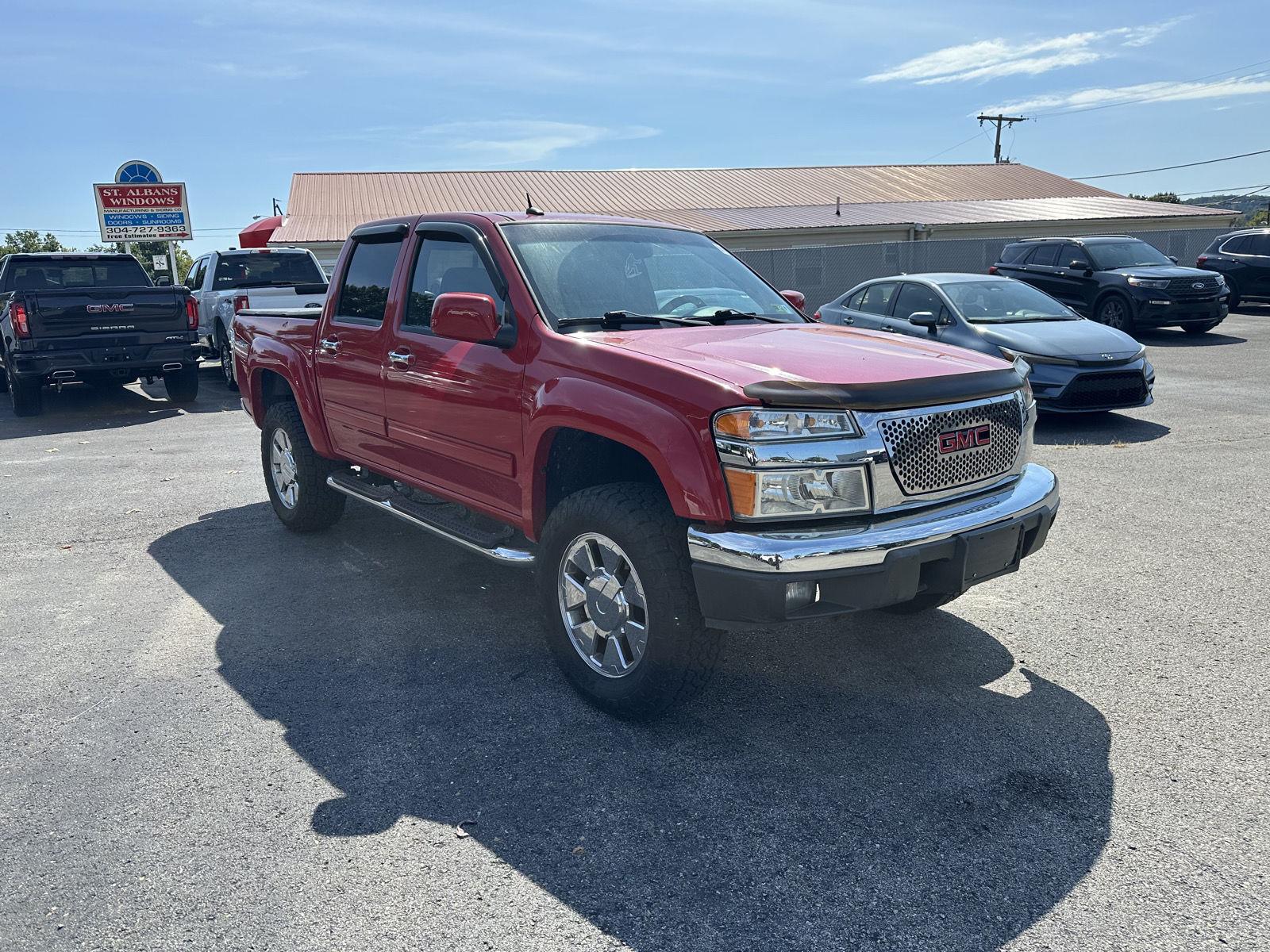 Fire Red 2010 GMC Canyon Pickup Truck Four-Wheel Drive 4-Speed Automatic