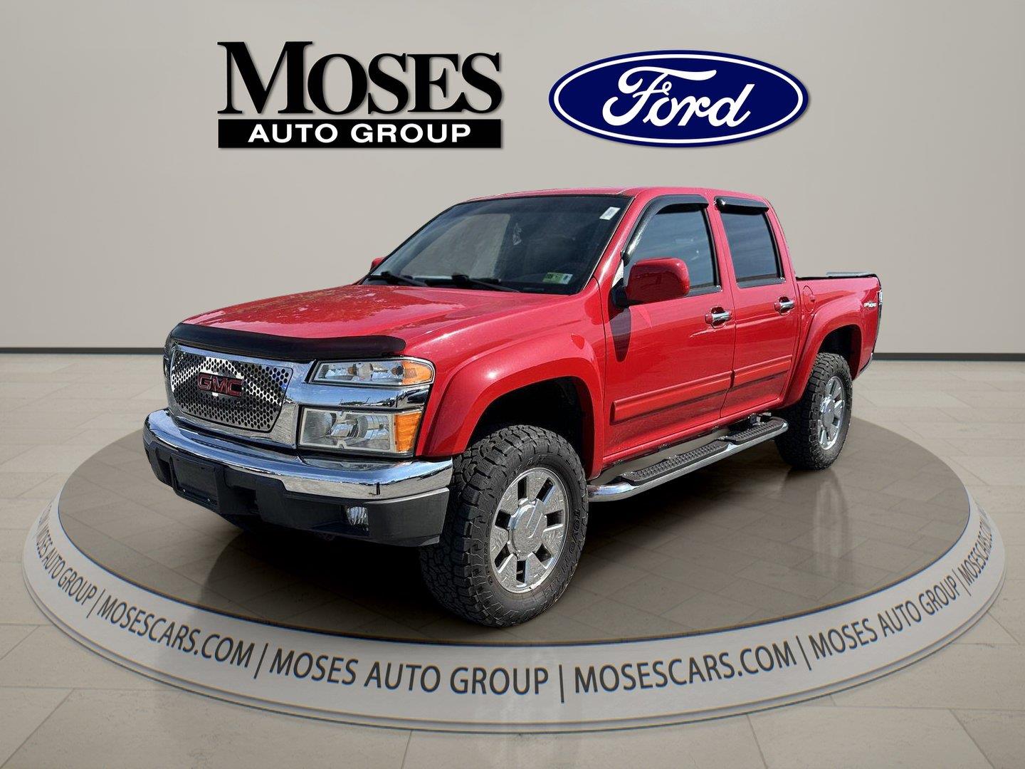 Fire Red 2010 GMC Canyon Pickup Truck Four-Wheel Drive 4-Speed Automatic
