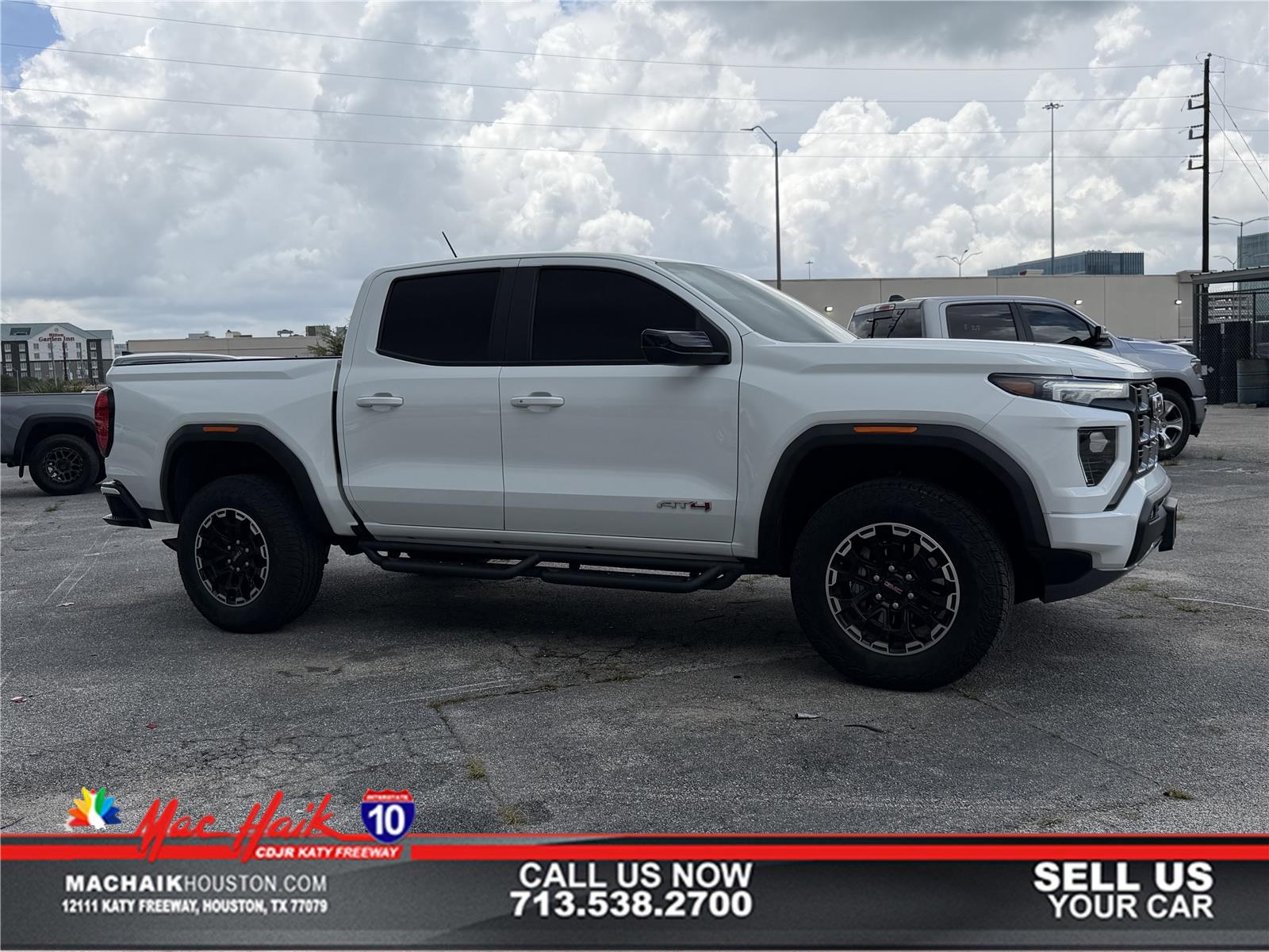 Summit White 2026 GMC Canyon AT4 Crew Cab 4WD Pickup Truck Four-Wheel Drive 8-Speed Automatic