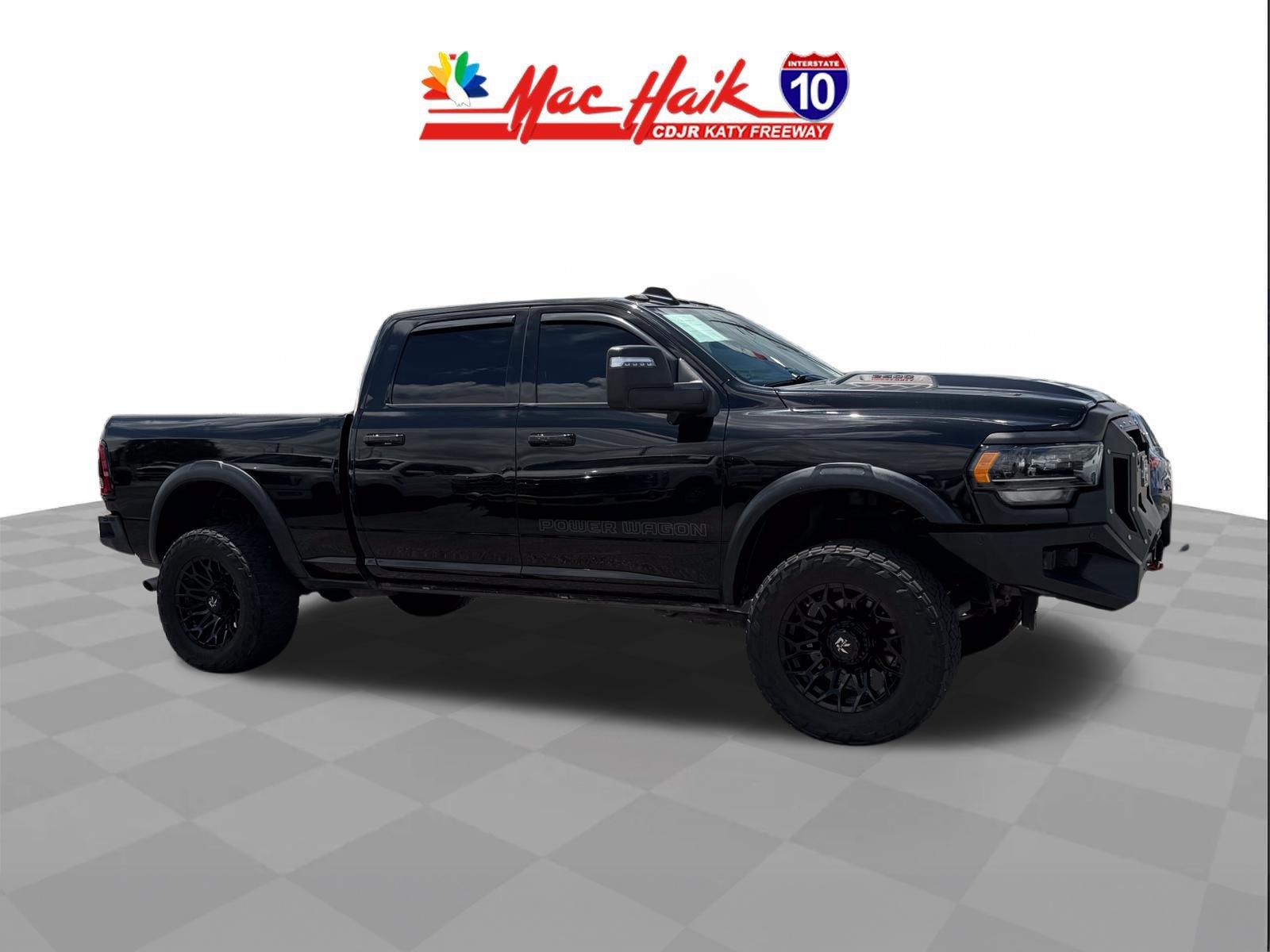 Diamond Black Crystal Pearlcoat 2023 RAM 2500 Pickup Truck Four-Wheel Drive 8-Speed Automatic