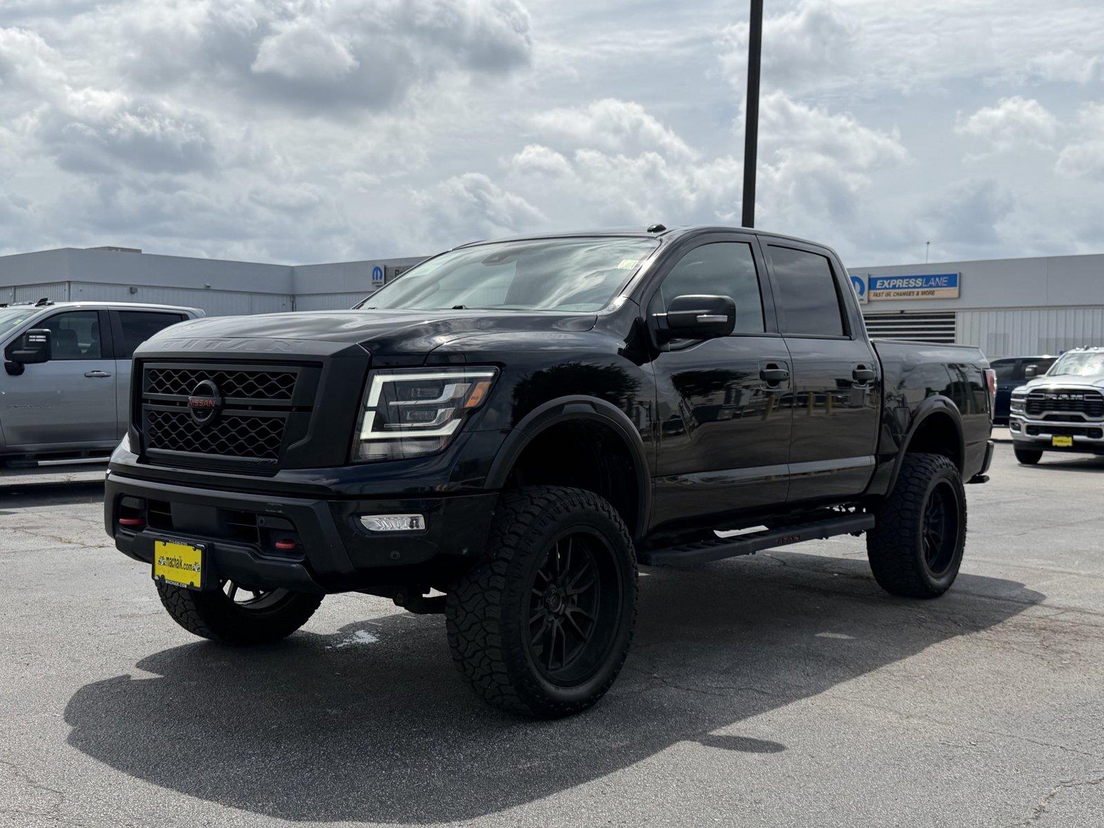 Super Black 2021 Nissan Titan Pickup Truck Four-Wheel Drive Automatic