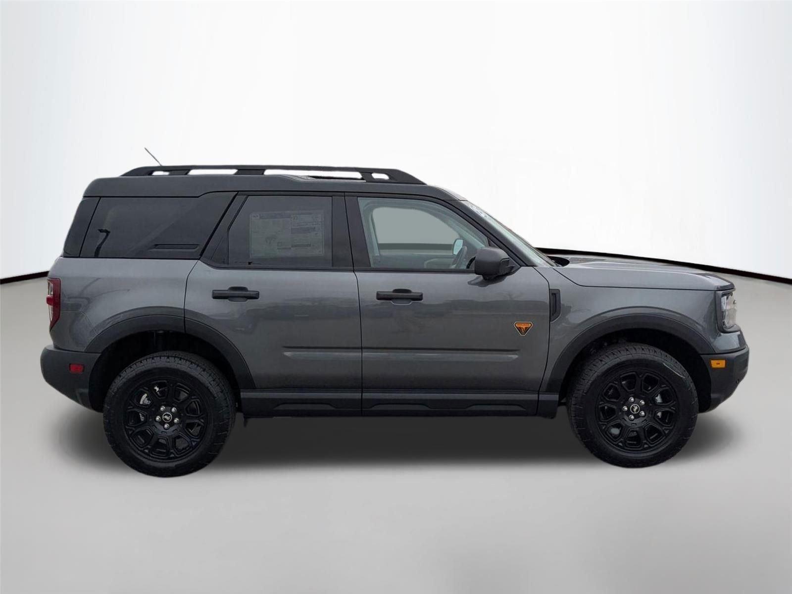 New 2025 Carbonized Gray Metallic Ford Badlands image 6