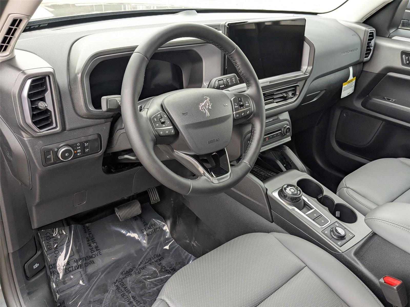New 2025 Carbonized Gray Metallic Ford Badlands image 16