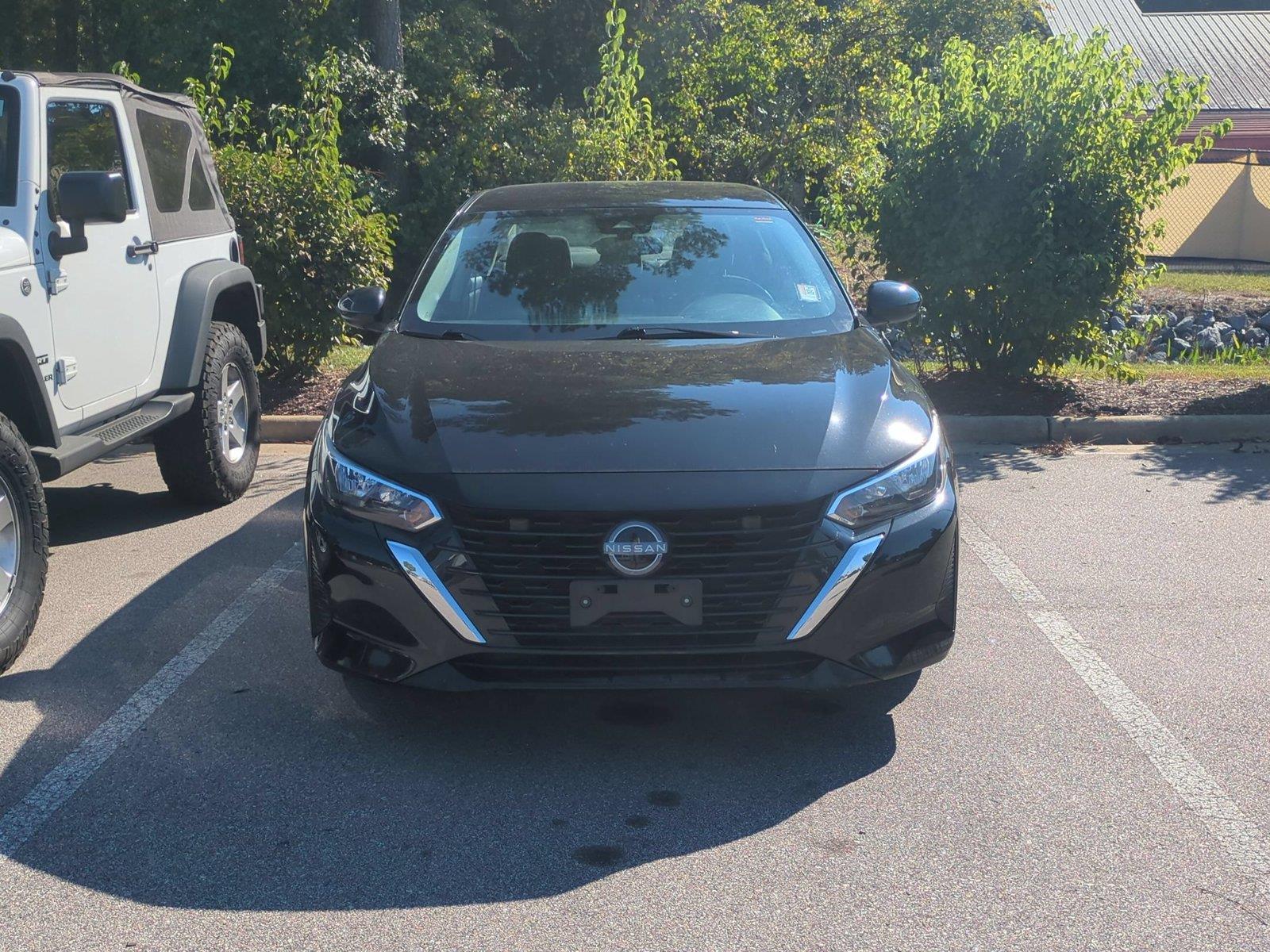 Used 2024 Super Black Nissan SV image 2