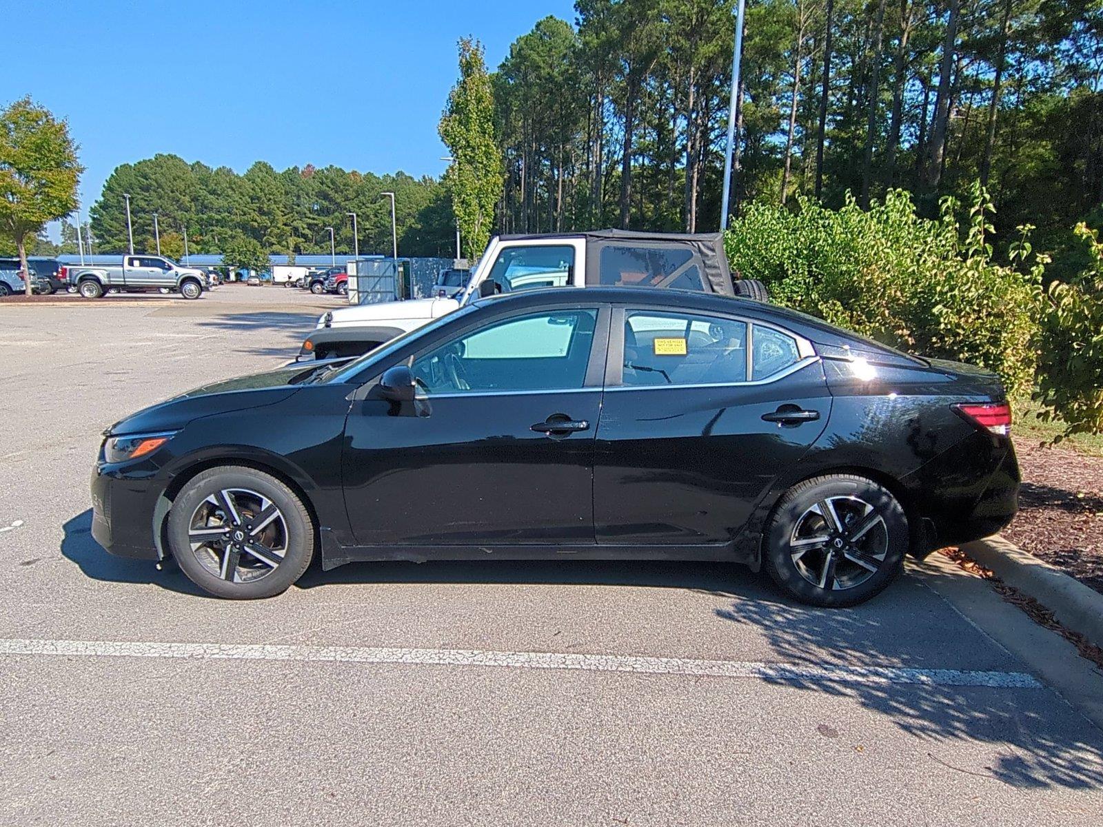 Used 2024 Super Black Nissan SV image 4