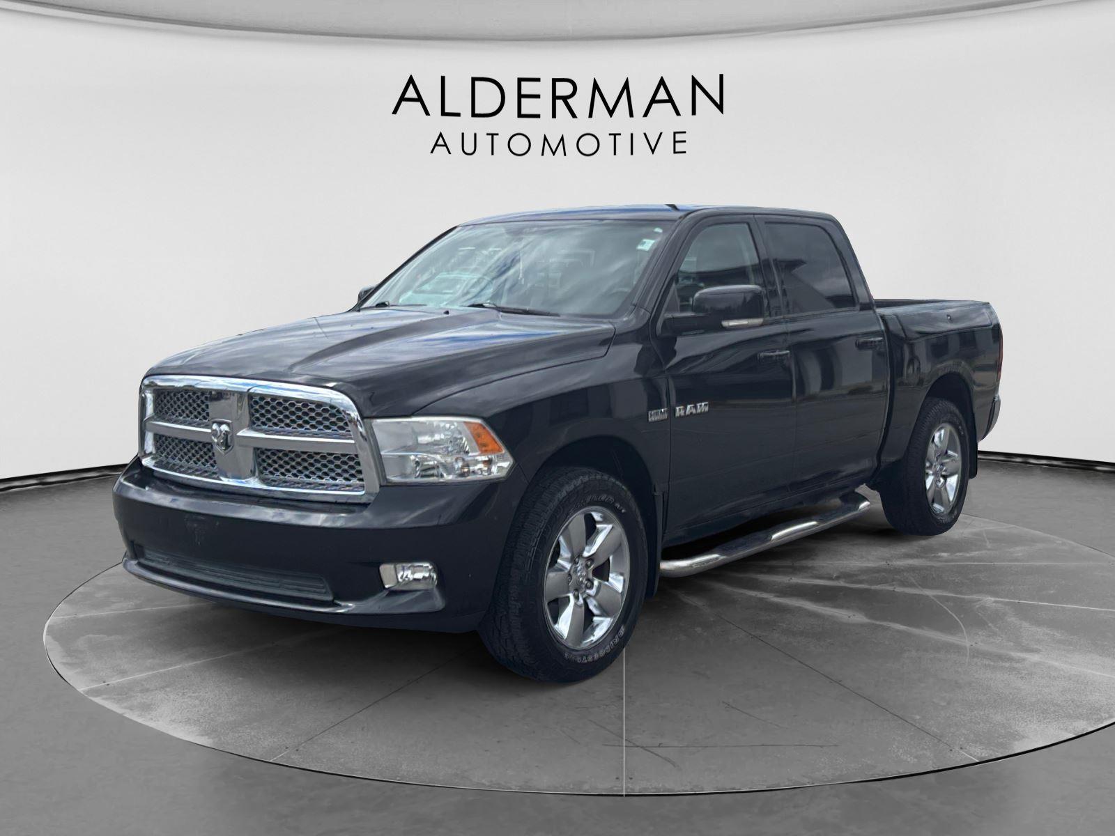 Brilliant Black Pearl 2009 Dodge RAM 1500 Pickup Truck 5-Speed Automatic