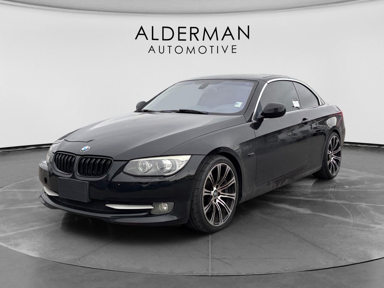 Jet Black 2012 BMW 3 Series 335i Convertible RWD Convertible Rear-Wheel Drive 6-Speed Manual