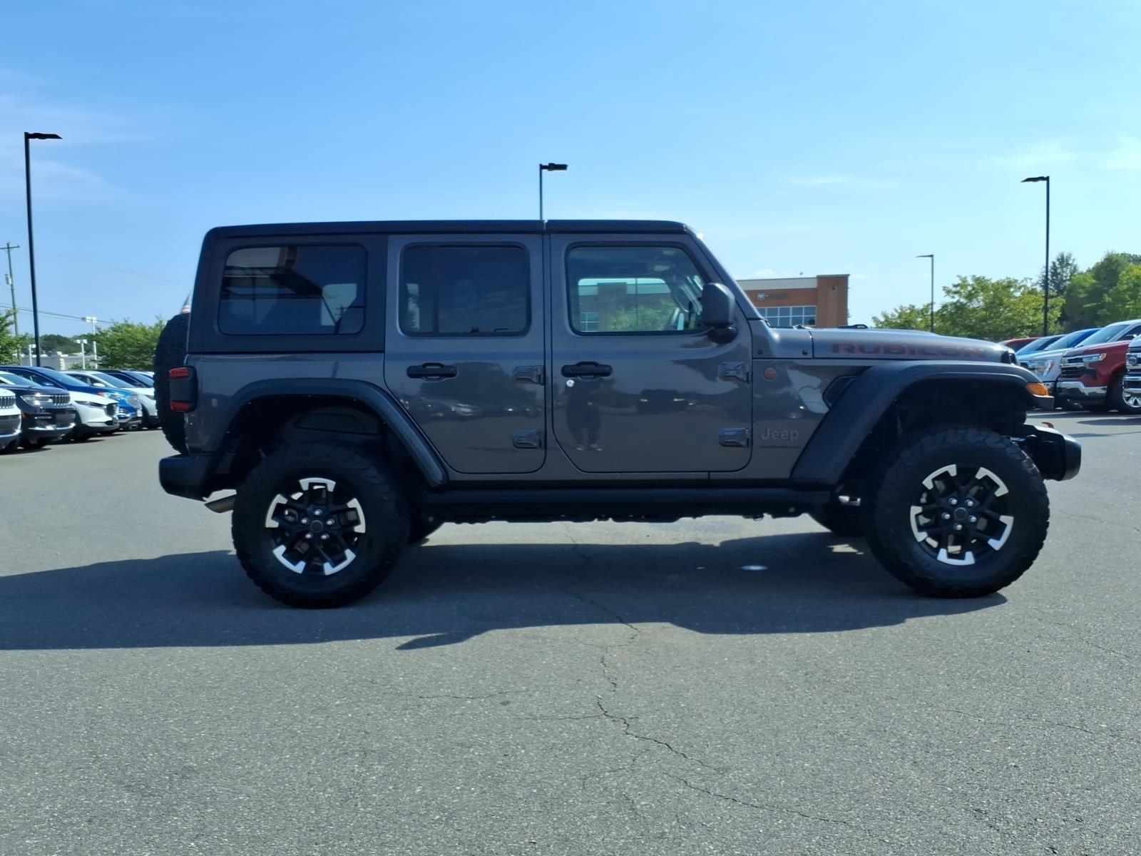 Used 2025 Granite Crystal Metallic Clearcoat Jeep Rubicon image 12