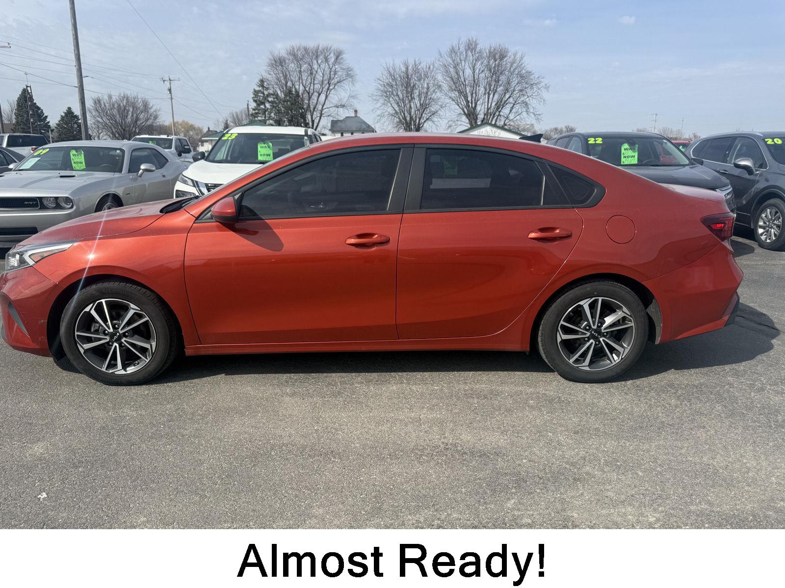 Fire Orange 2023 Kia Forte LXS FWD Sedan Front-Wheel Drive Continuously Variable Transmission