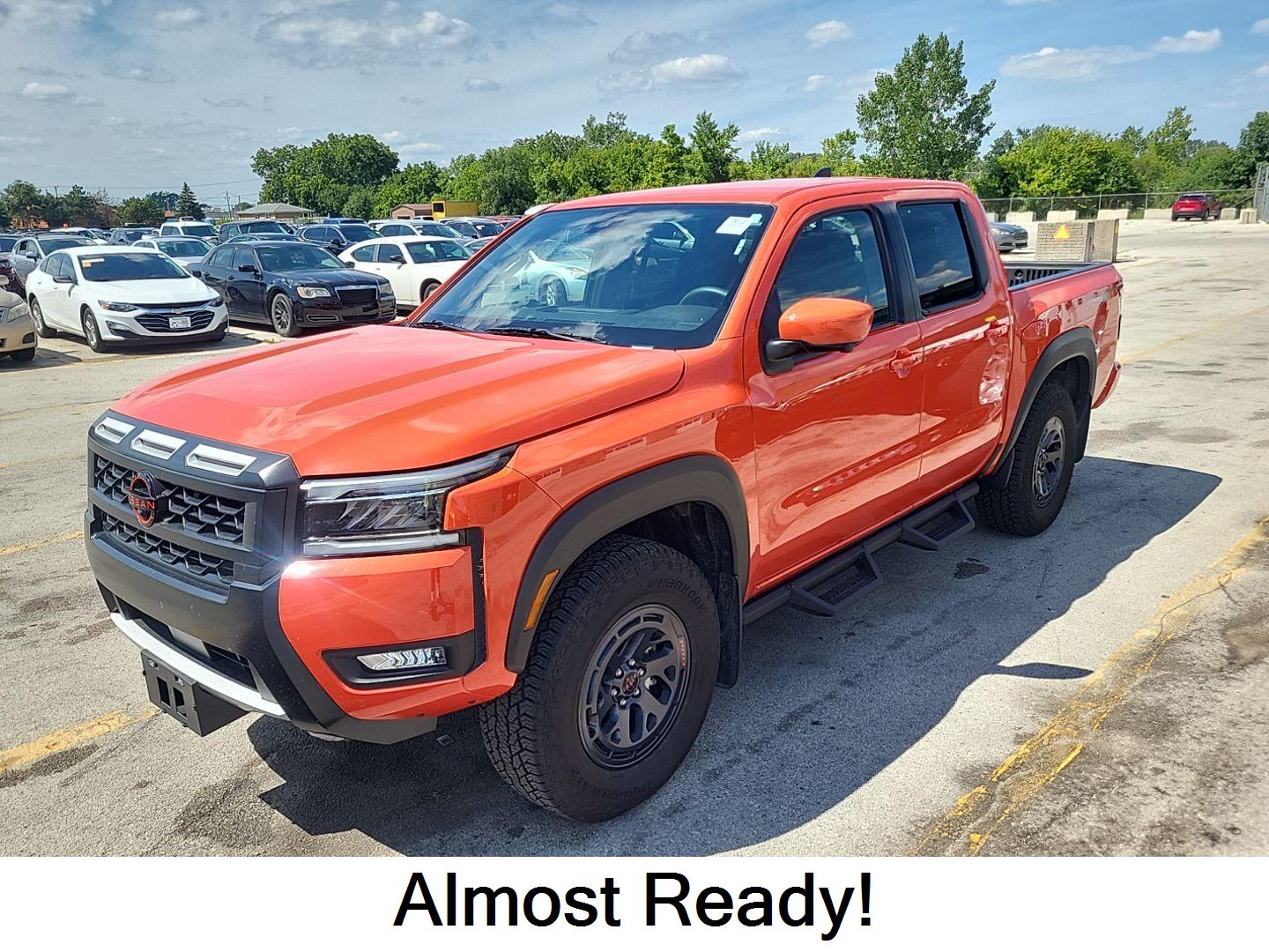 Afterburn Orange 2025 Nissan Frontier Pickup Truck Four-Wheel Drive Automatic