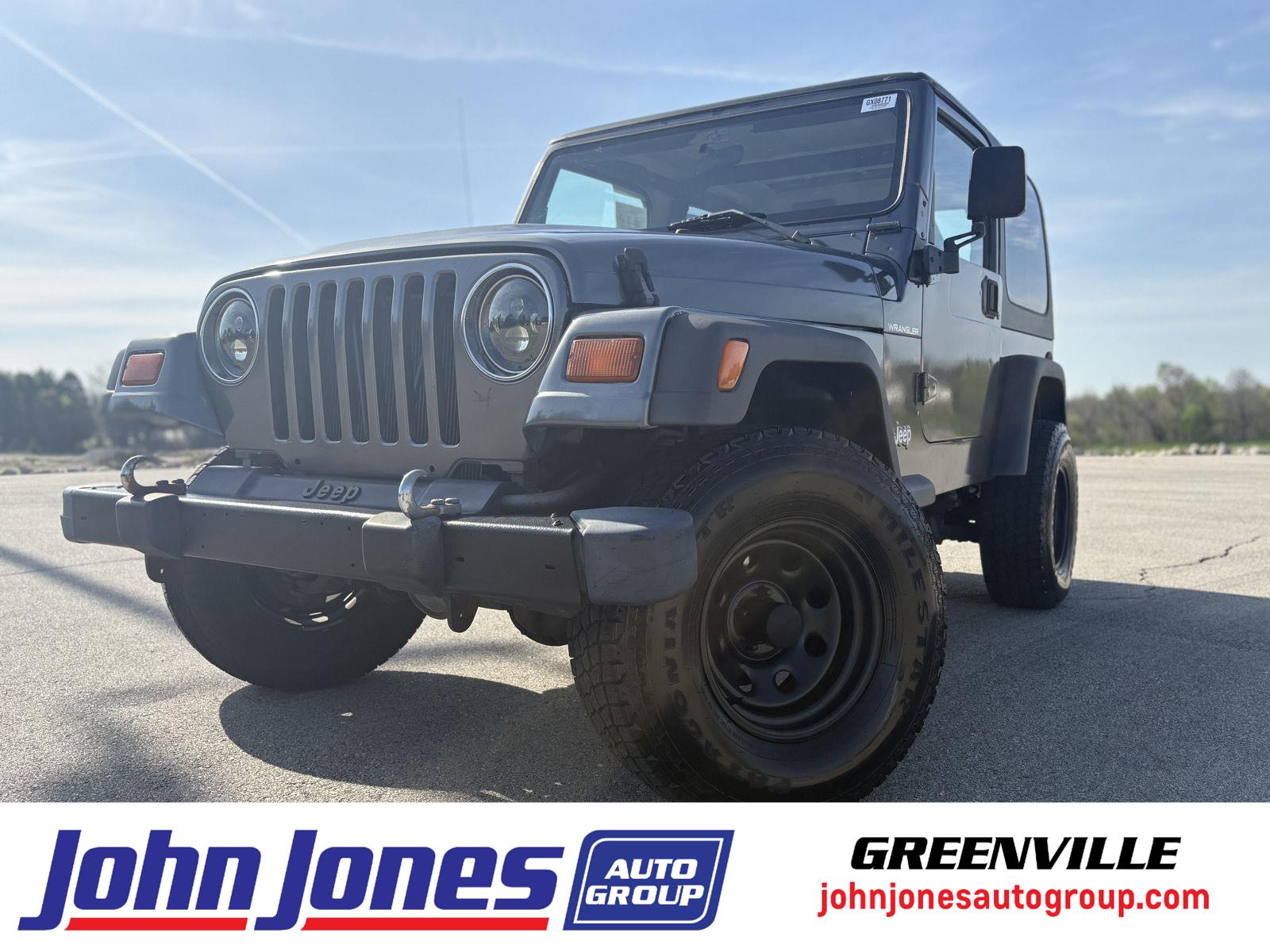 Gunmetal (PC) 1998 Jeep Wrangler Sport SUV / Crossover Four-Wheel Drive 5-Speed Manual Overdrive