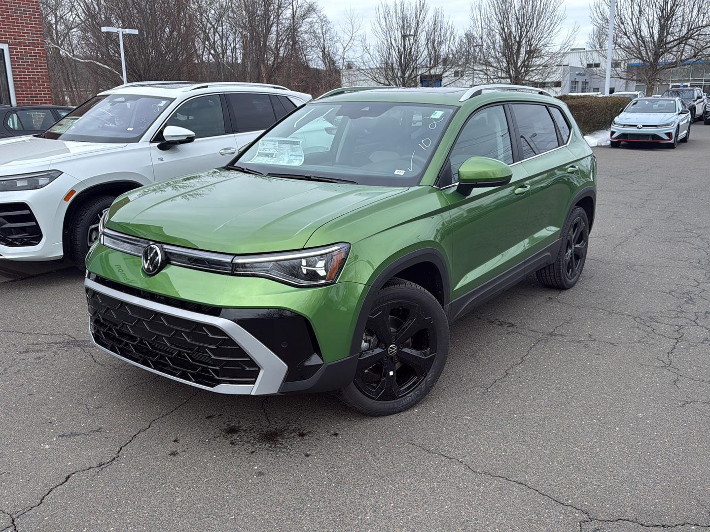 Bright Moss Green Metallic 2026 Volkswagen Taos SUV / Crossover All-Wheel Drive Automatic