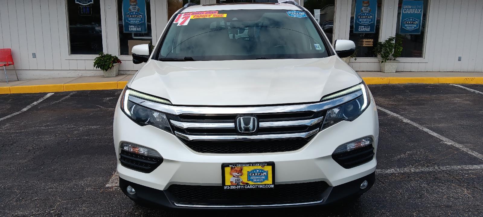 Used 2017 Honda Pilot Touring with VIN 5FNYF6H93HB012647 for sale in Kansas City