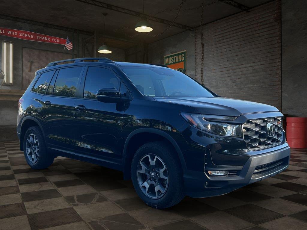 View vehicle photo 3