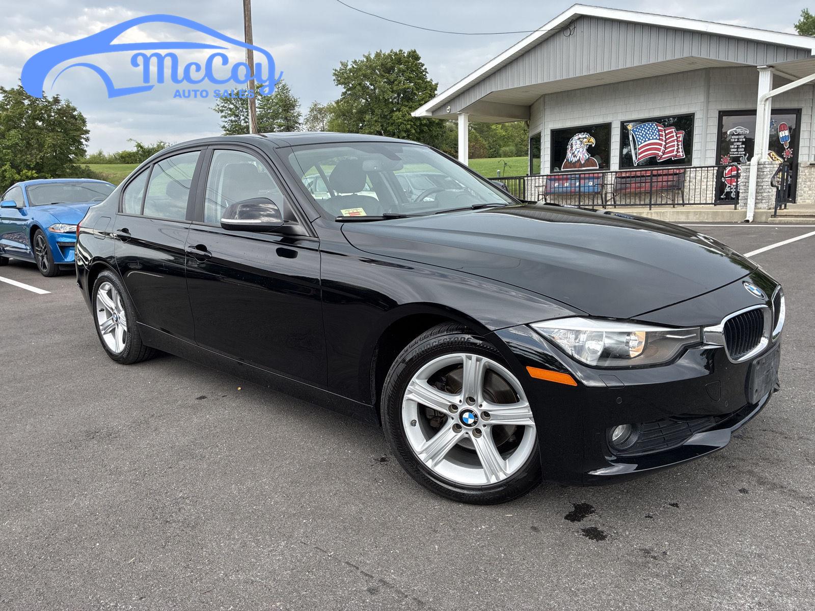Jet Black 2013 BMW 3 Series Sedan All-Wheel Drive 8-Speed Automatic