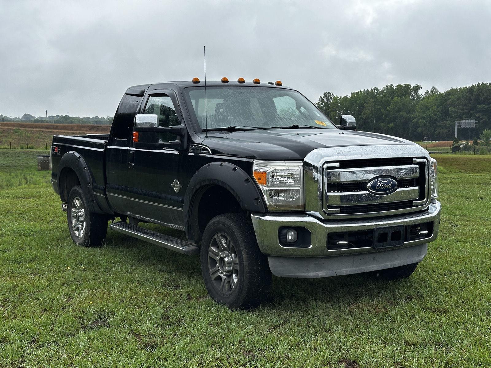 Tuxedo Black Metallic 2011 Ford F-350 Super Duty Pickup Truck Four-Wheel Drive 6-Speed Automatic