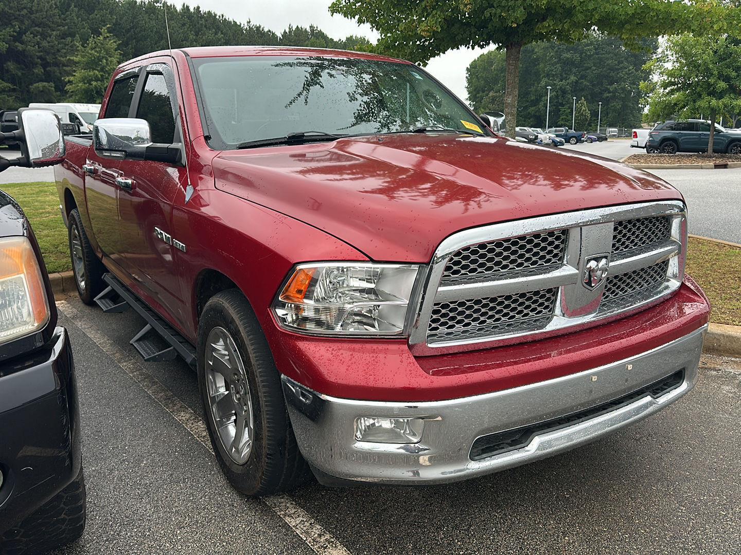 Inferno Red Crystal Pearl 2010 Dodge RAM 1500 Pickup Truck 4X2 5-Speed Automatic