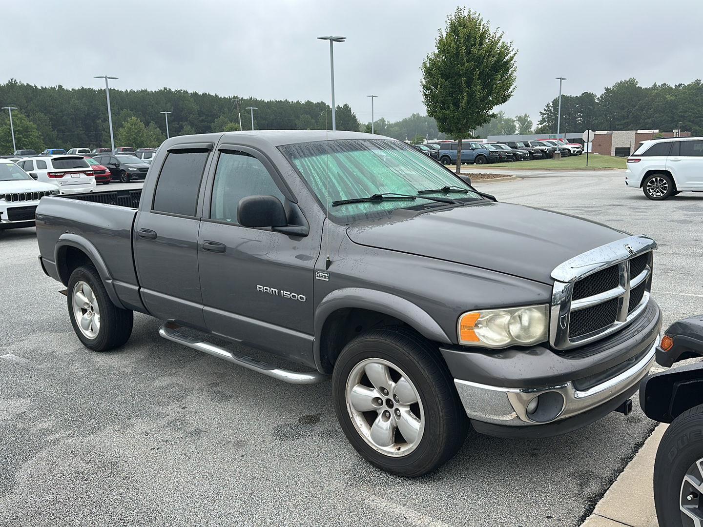 Gray (Graphite Metallic) 2004 Dodge RAM 1500 Pickup Truck Four-Wheel Drive 5-Speed Automatic Overdrive