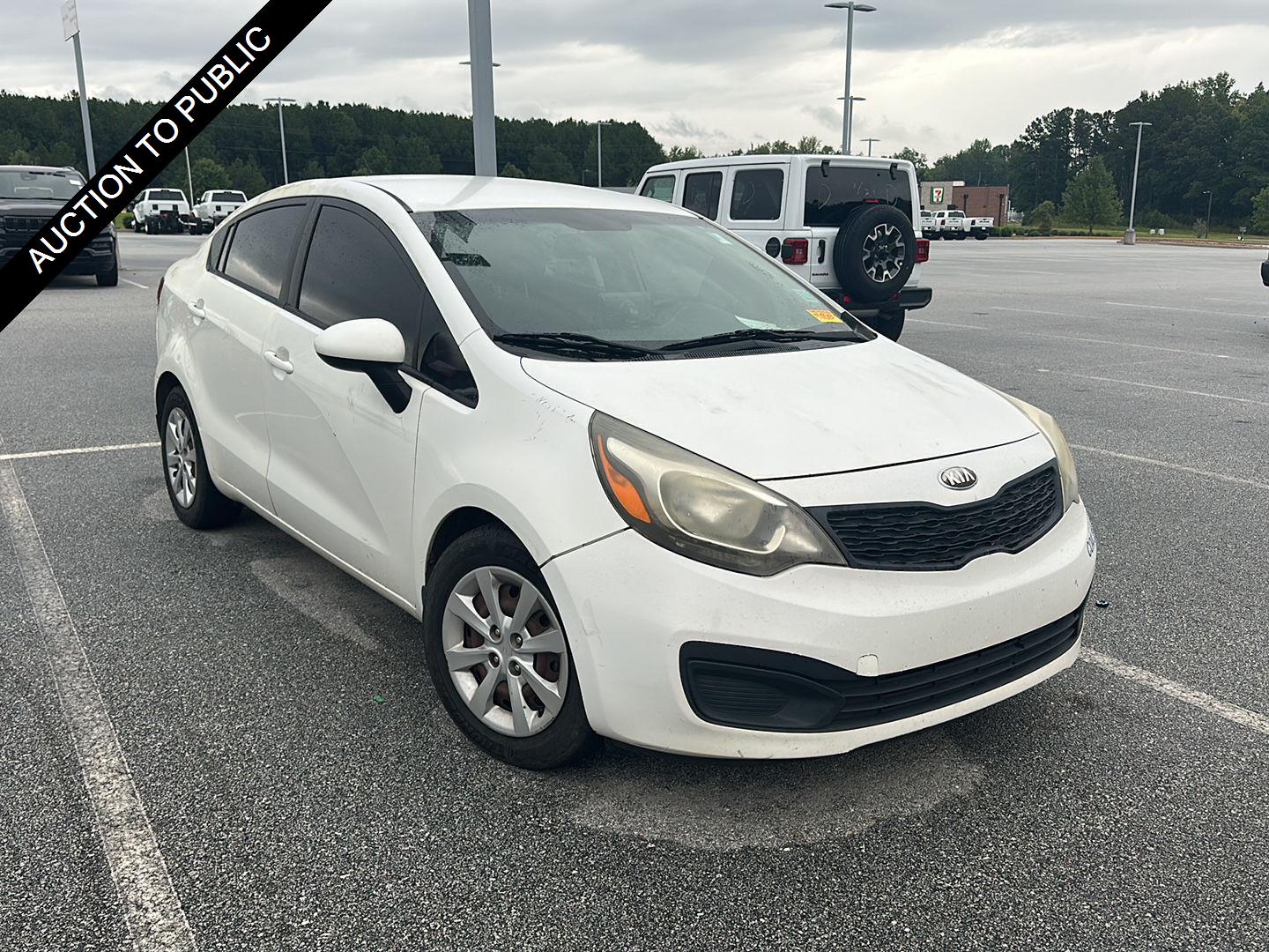 Clear White 2013 Kia Rio Sedan Front-Wheel Drive Automatic