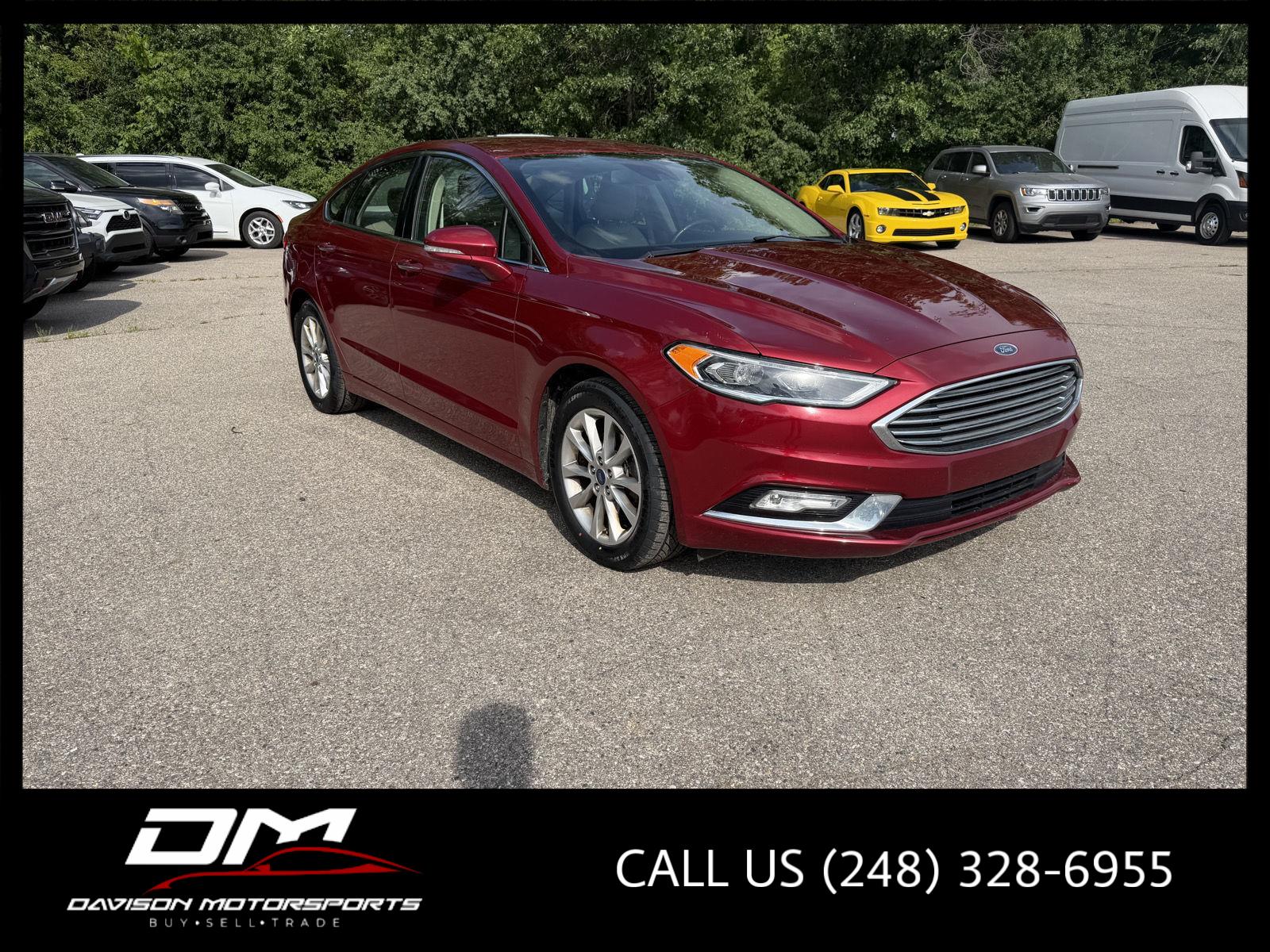 Ruby Red Metallic Tinted Clearcoat 2017 Ford Fusion Sedan Front-Wheel Drive Automatic