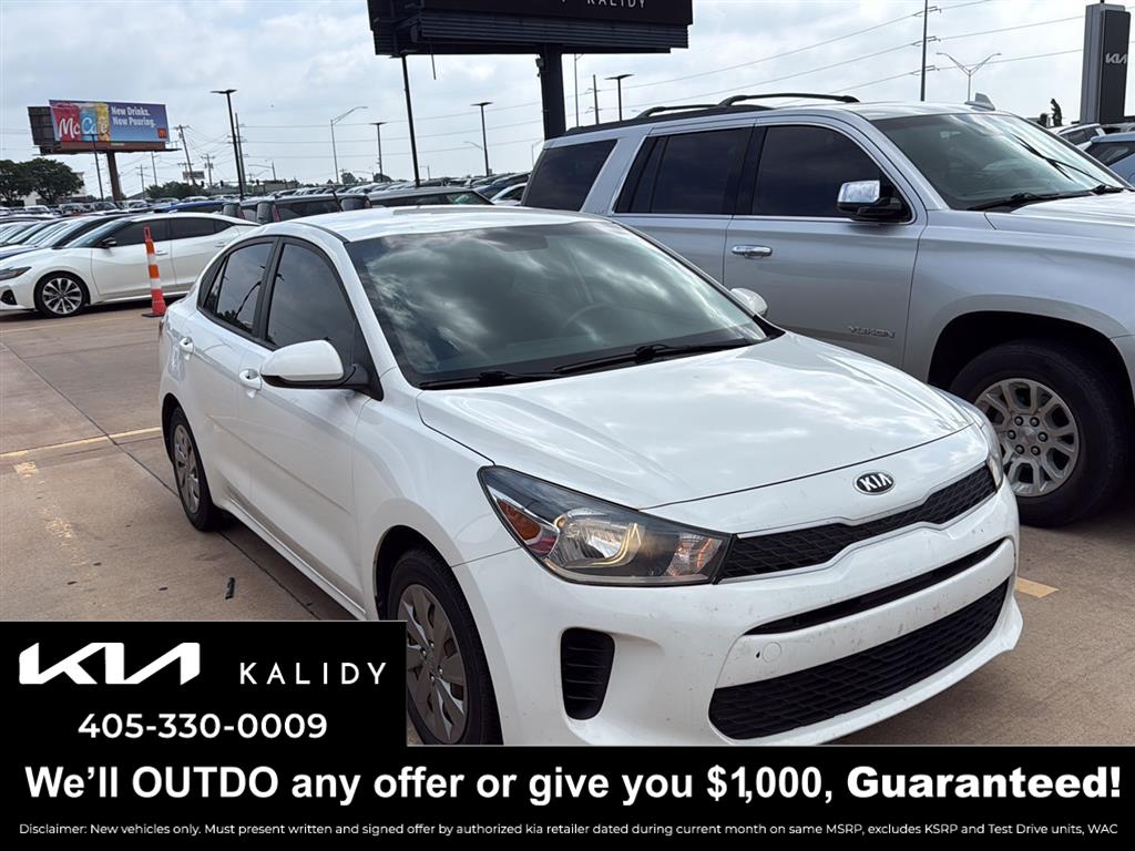 Clear White 2020 Kia Rio Sedan Front-Wheel Drive Continuously Variable Transmission