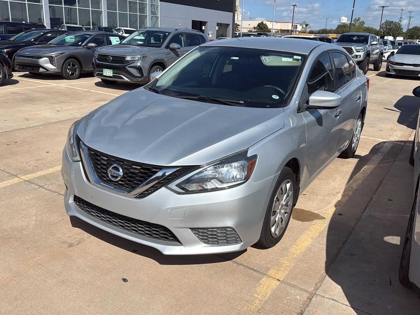 Brilliant Silver Metallic 2016 Nissan Sentra Sedan Front-Wheel Drive Manual