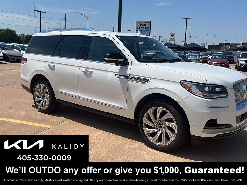 Pristine White Metallic Tri-Coat 2024 Lincoln Navigator SUV / Crossover Four-Wheel Drive Automatic