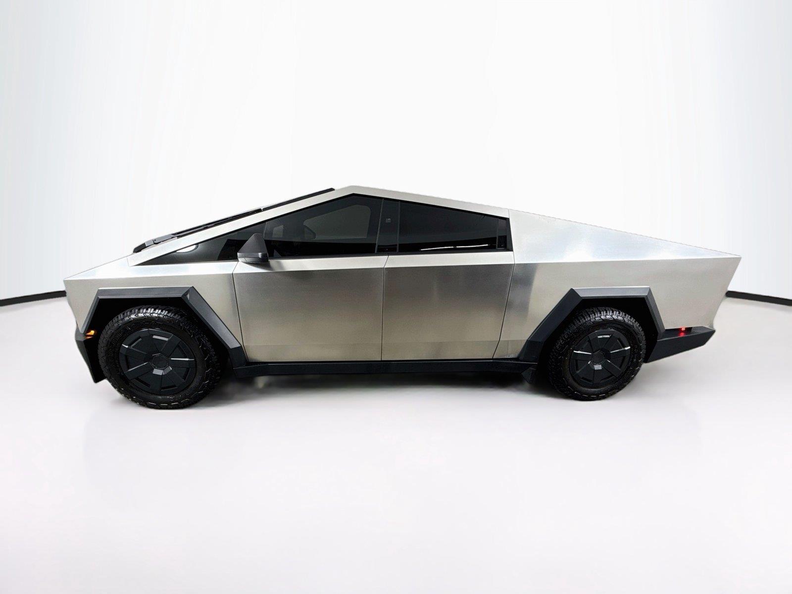 Used 2025 Tesla Cybertruck Base with VIN 7G2CEHEDXSA069138 for sale in New Port Richey, FL