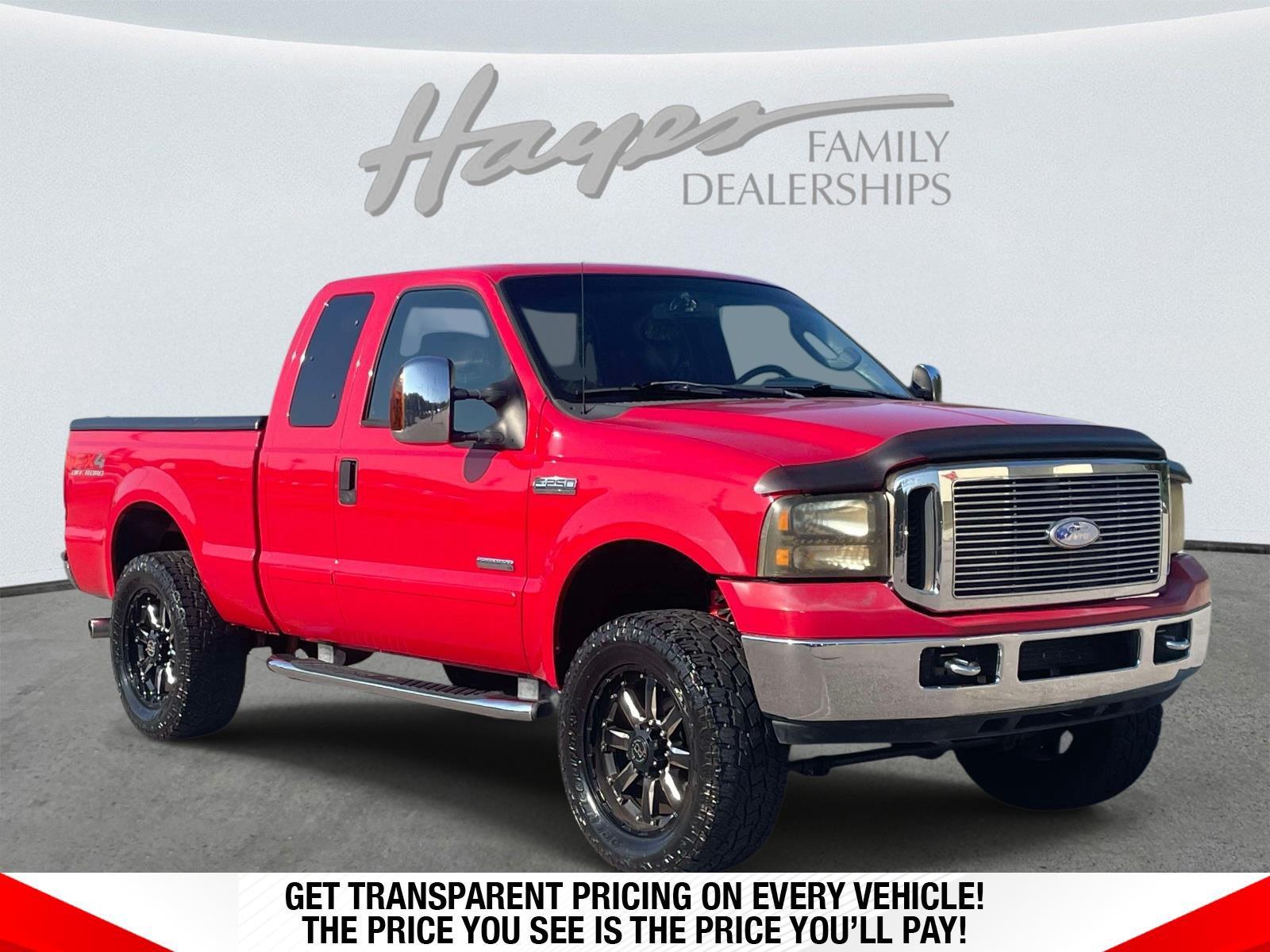 Red 2007 Ford F-250 Super Duty Pickup Truck Four-Wheel Drive