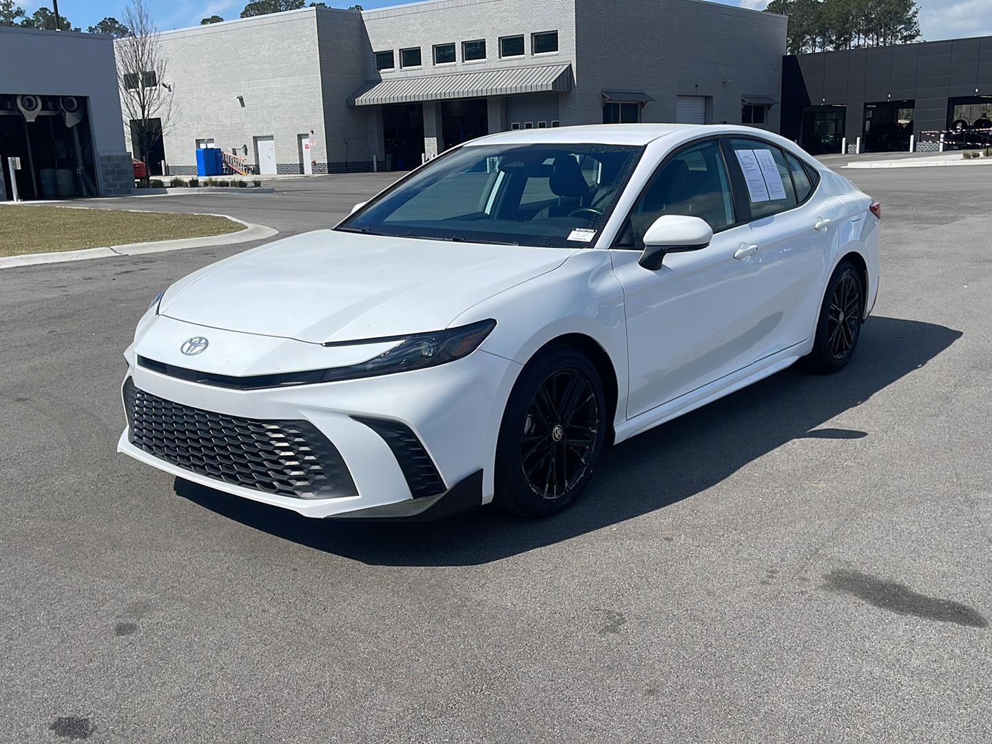 View vehicle photo 3