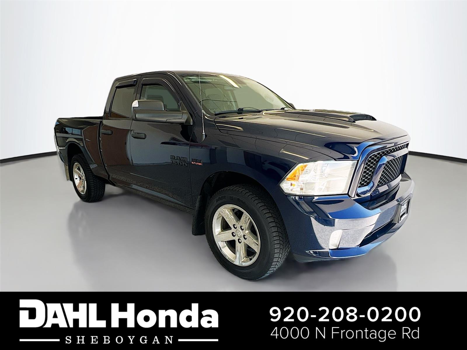 True Blue Pearlcoat 2016 RAM 1500 Express Quad Cab 4WD Pickup Truck Four-Wheel Drive 8-Speed Automatic