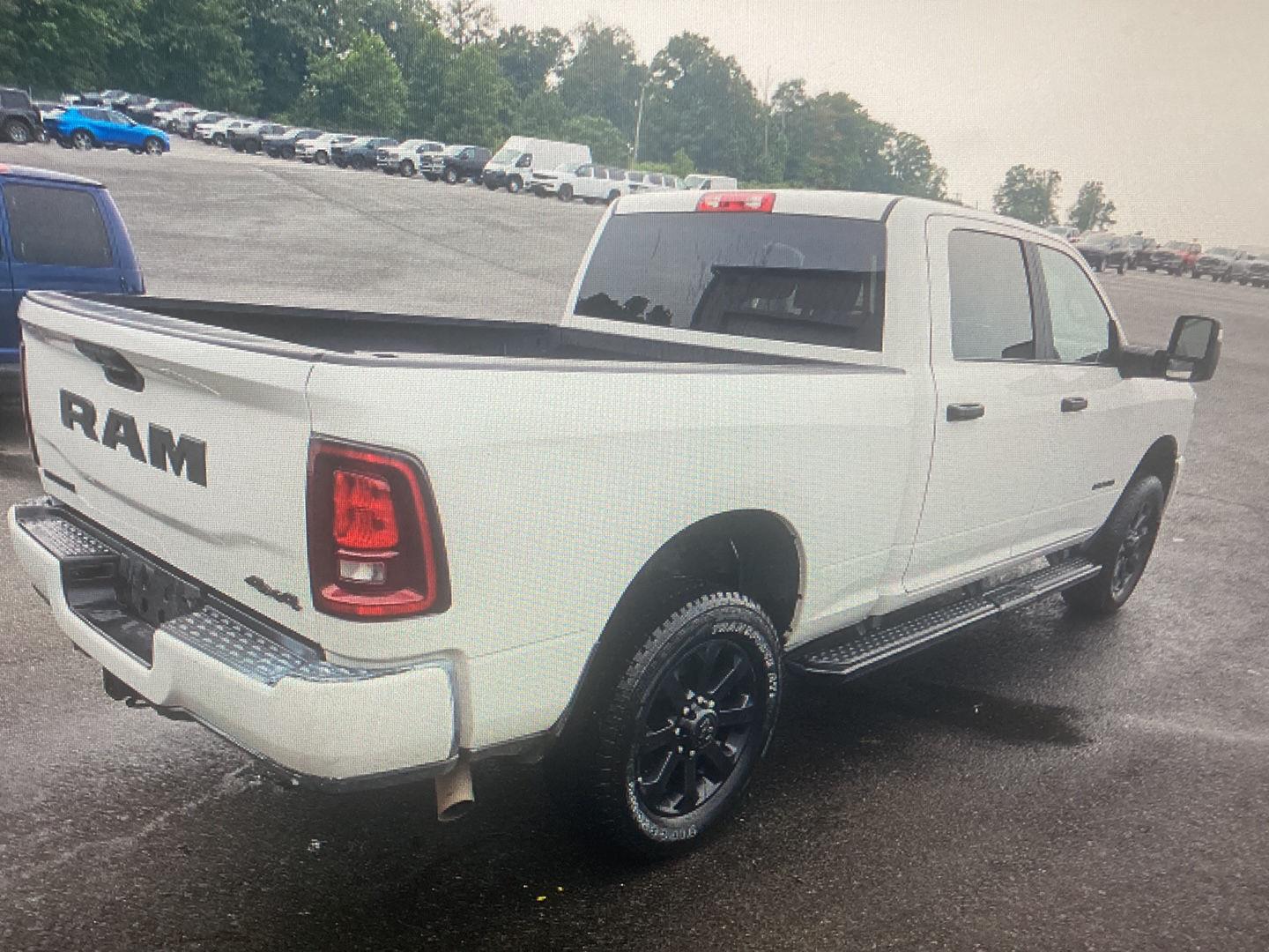Used 2025 Bright White Clearcoat Ram Big Horn image 2