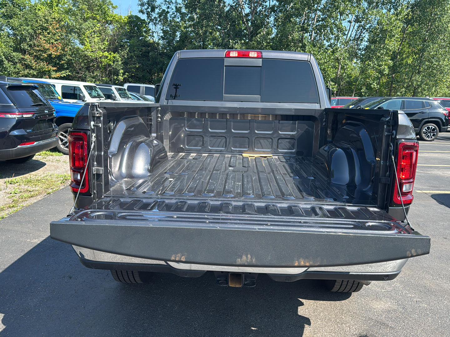 Used 2025 Granite Crystal Metallic Clearcoat Ram Tradesman image 9