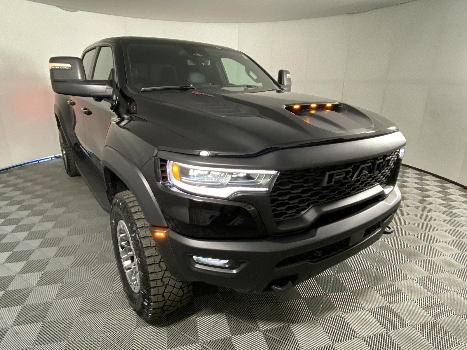 Used 2025 Diamond Black Crystal Pearlcoat Ram RHO image 19