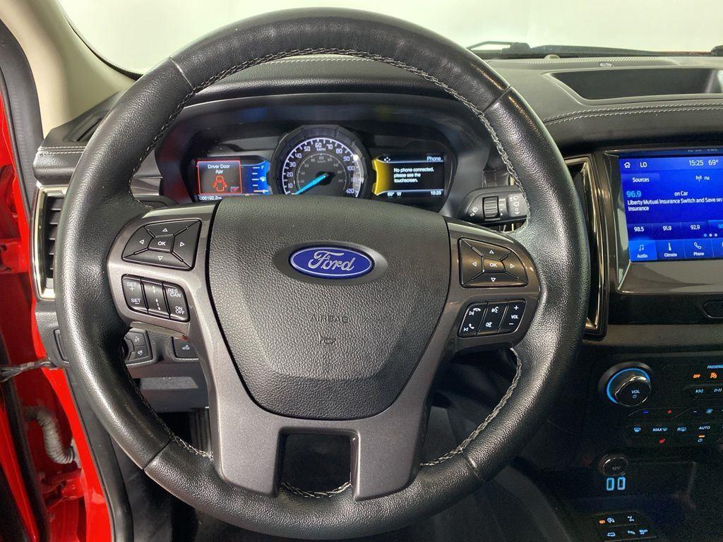 Used 2021 Rapid Red Metallic Tinted Clea Ford Lariat image 18