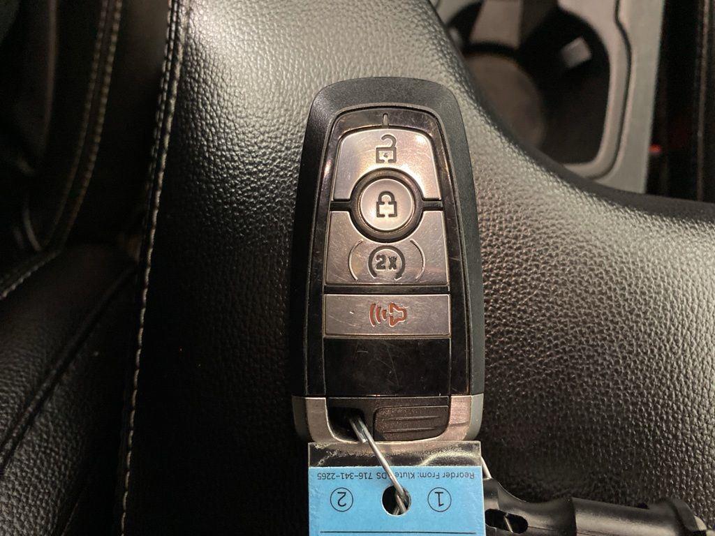 Used 2021 Rapid Red Metallic Tinted Clea Ford Lariat image 7