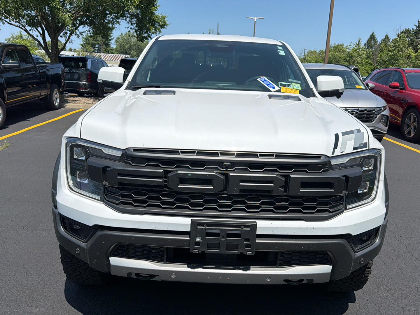 Used 2025 Oxford White Ford Raptor image 2