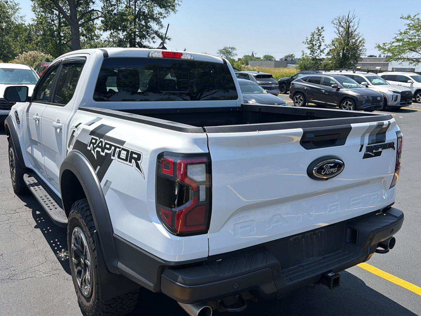 Used 2025 Oxford White Ford Raptor image 4