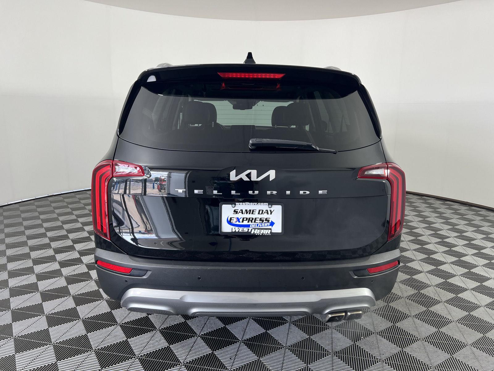 Used 2022 Ebony Black Kia EX image 4
