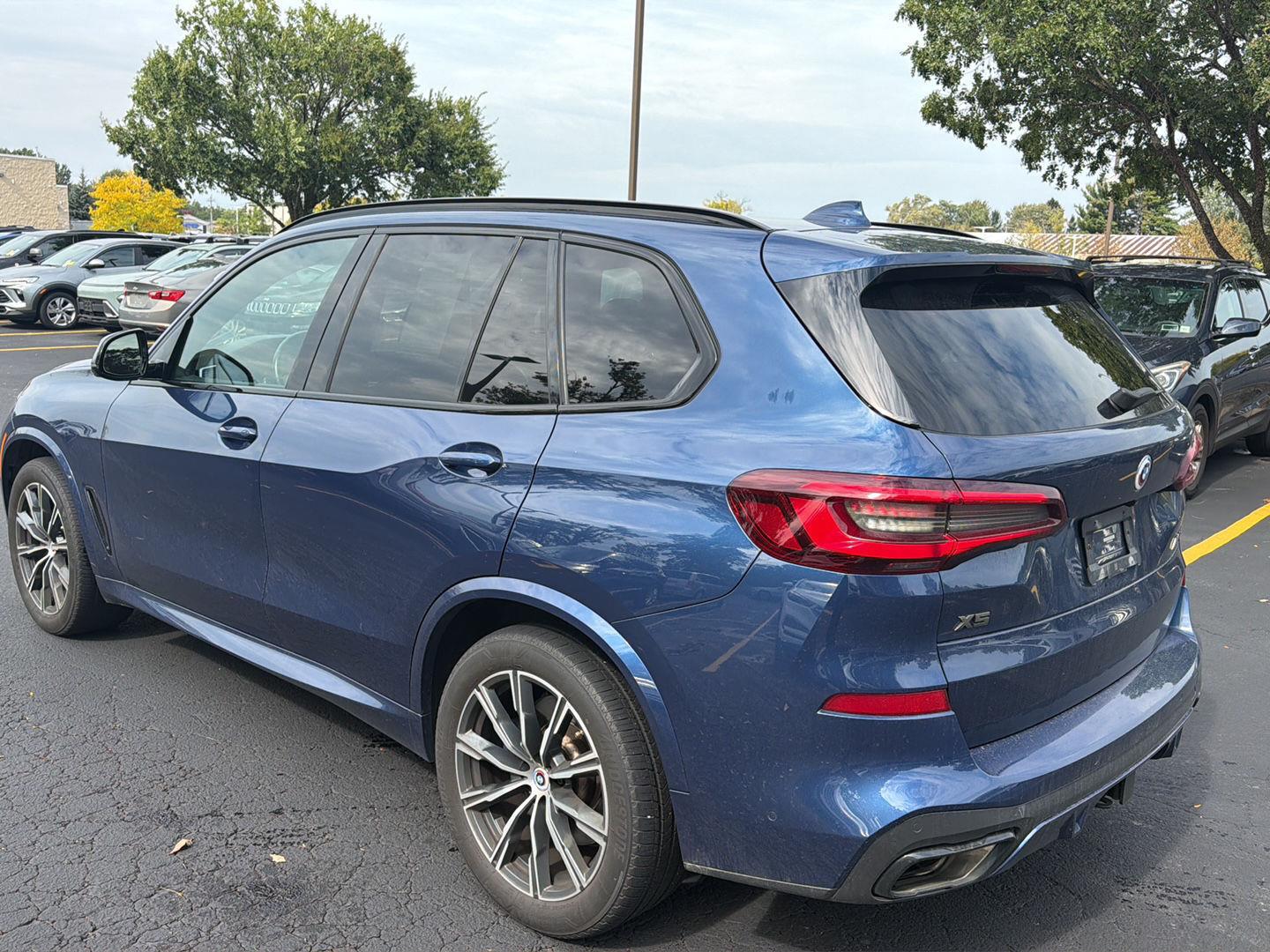 Used 2023 Phytonic Blue Metallic BMW M50i image 4
