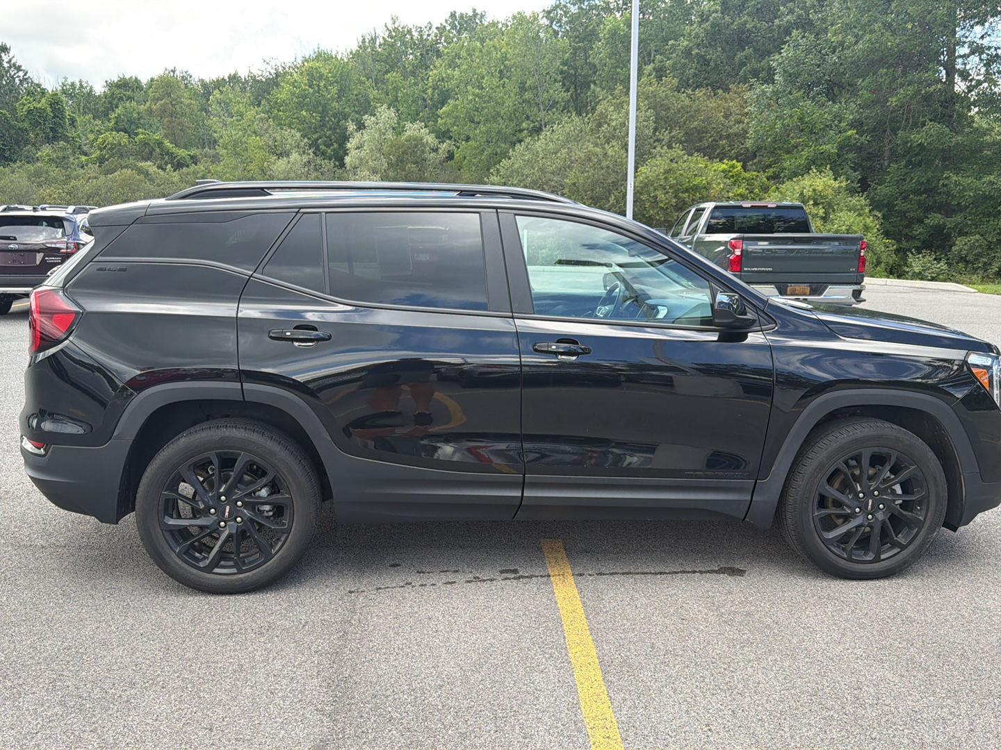 Used 2023 Ebony Twilight Metallic GMC SLE image 3