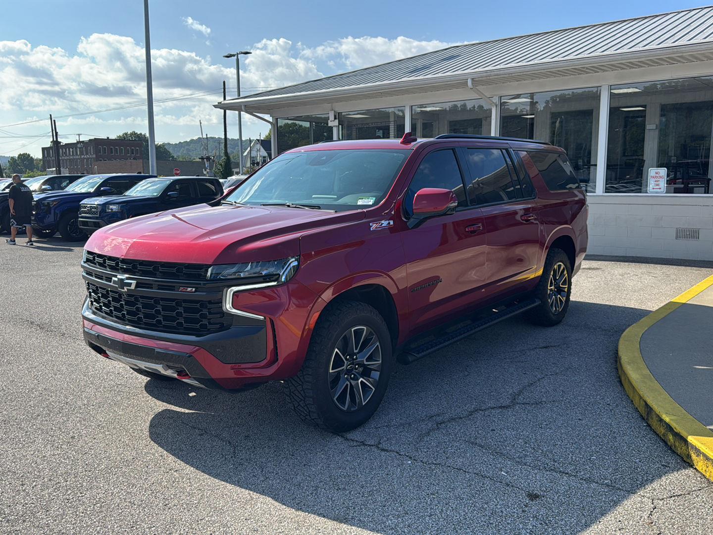 Radiant Red Tintcoat 2023 Chevrolet Suburban SUV / Crossover Four-Wheel Drive Automatic